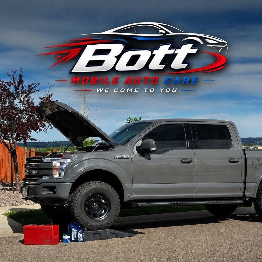 Bott Mobile Auto Care performing a mobile oil change in a customer's driveway